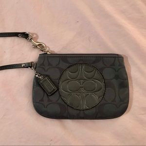 NEVER BEEN USED. Coach wristlet 😻